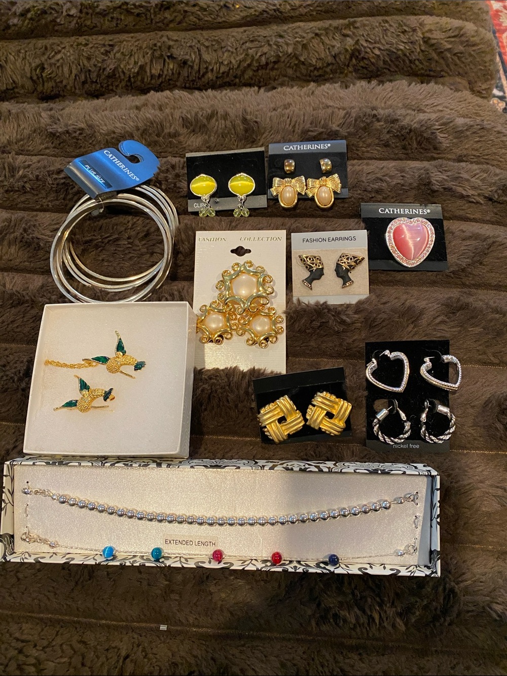 Catherine’s Pink Heart brooch with assorted other vintage pieces both
